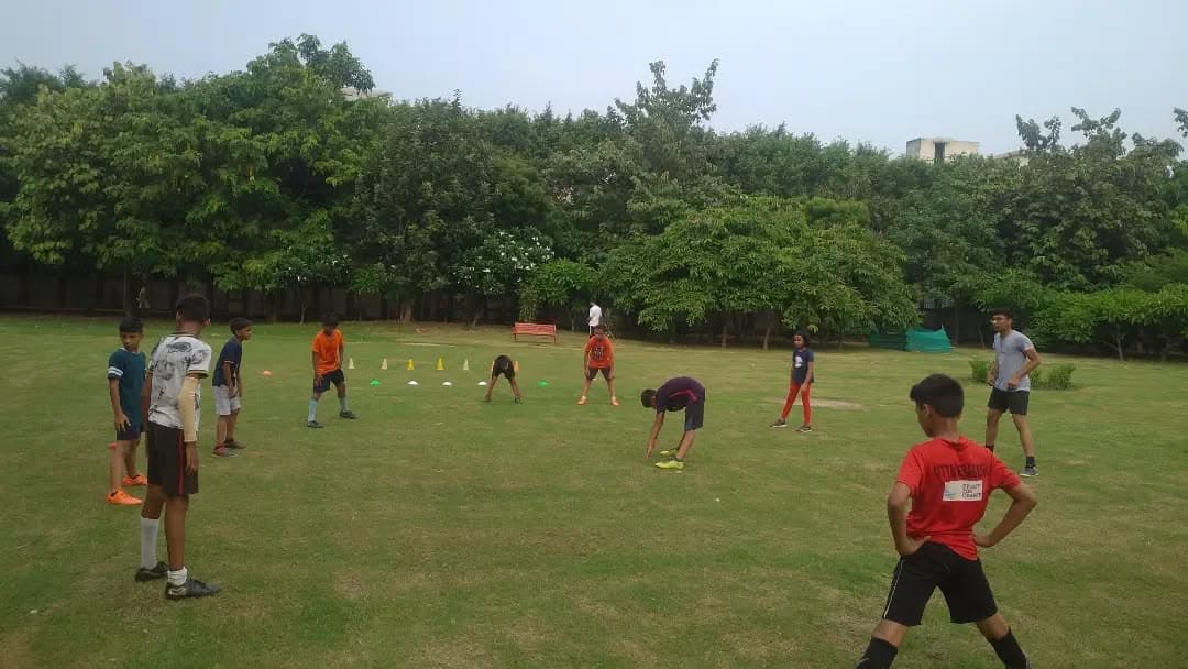 Goalkeeper diving to save a ball